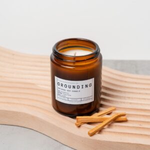 Top view of the Grounding candle with smooth wax and centered wick.