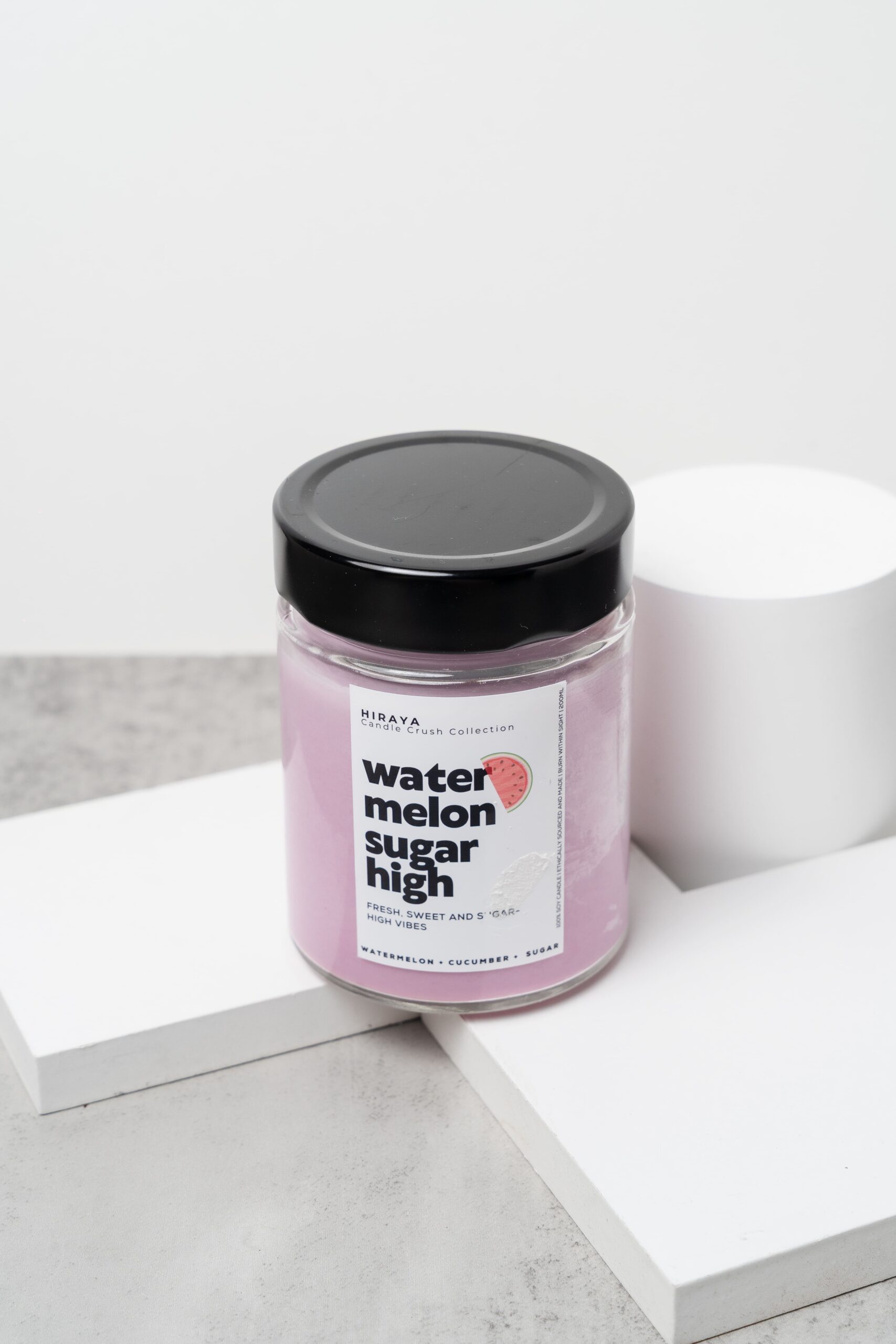 Close‑up of the Berry Much in Love candle showing creamy wax and strawberry‑raspberry label details.