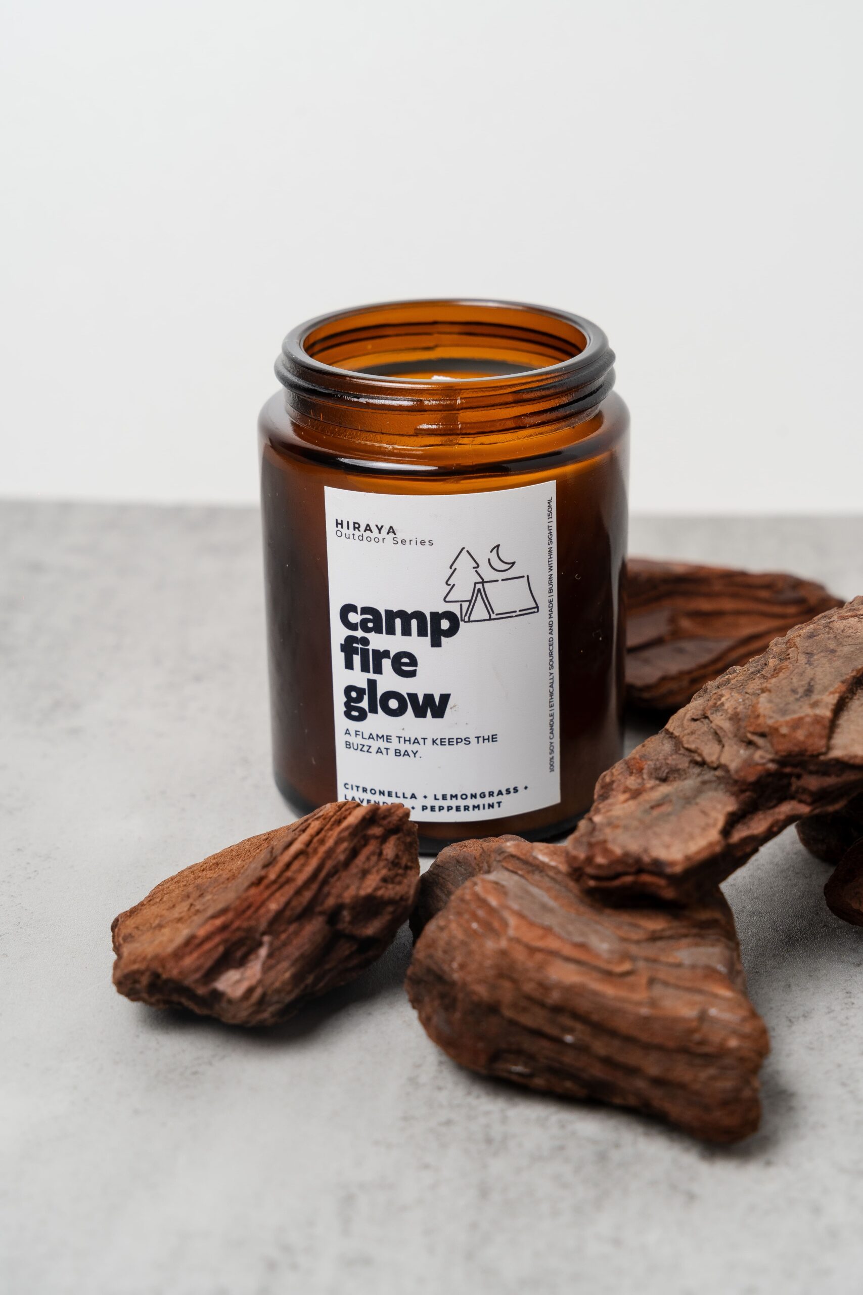 Front view of the Campfire Glow candle with citronella‑eucalyptus‑lavender label in 150ml or 280ml jars.
