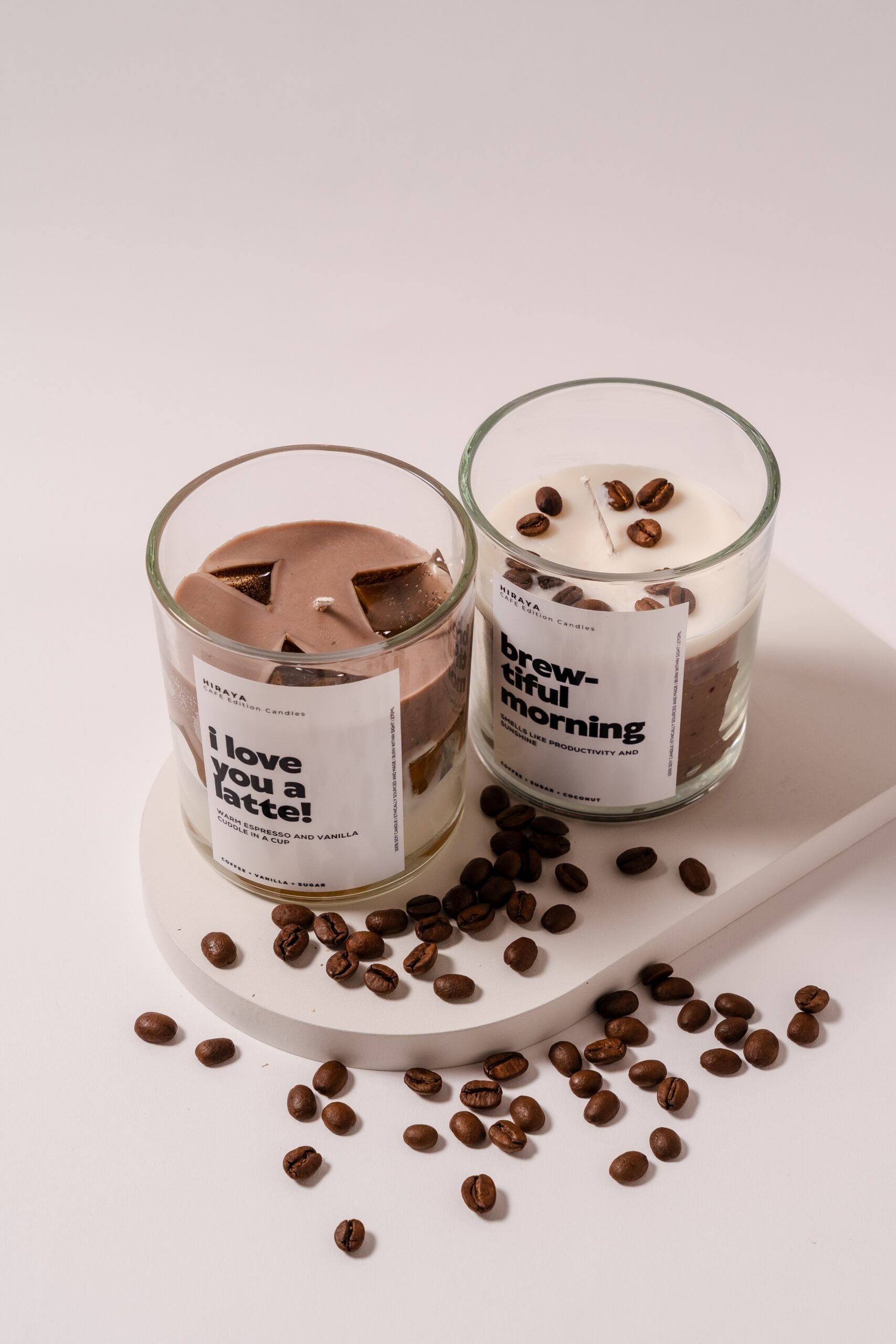 Top shot of Café Collection candles showing label designs and cohesive café‑themed aesthetic