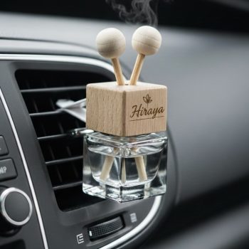 Car Fresheners – Long‑Lasting Fragrance for Everyday Drives Premium car freshener hanging inside a vehicle, providing long‑lasting fragrance and a clean, refreshing scent.